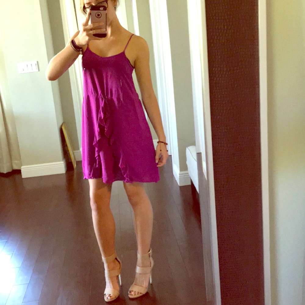 Dainty magenta sun dress with ruffles.